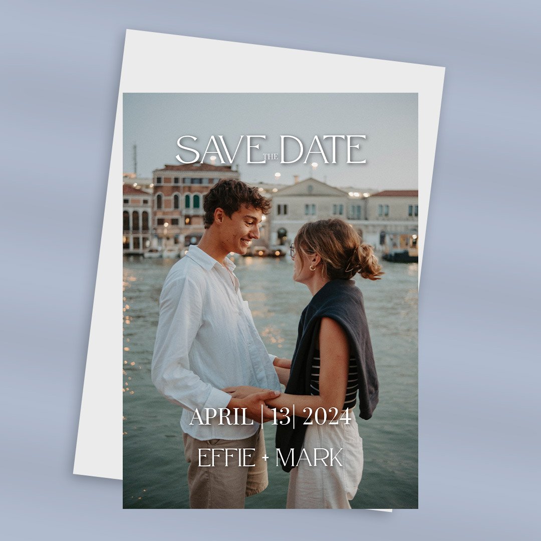 Vertical save the date card with couple's photo.